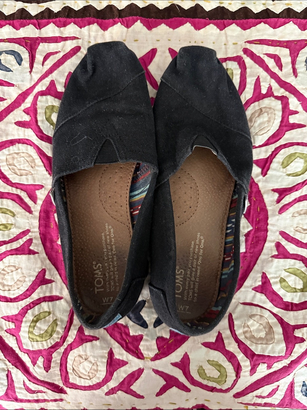 Toms Black Canvas Women's Slip-On Flats with Patterned Insole